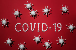 Concept of covid 19 in red background